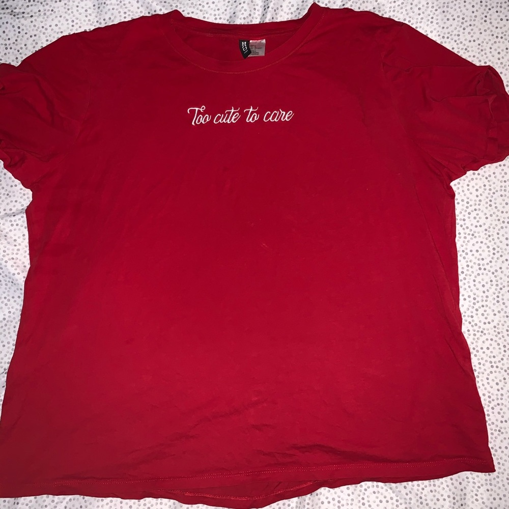 This is a red “too cute to care” top